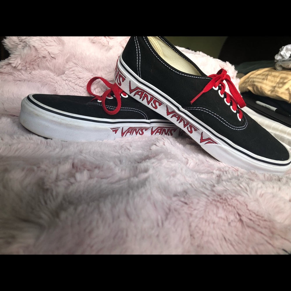 Red and Black Vans With Vans Logo